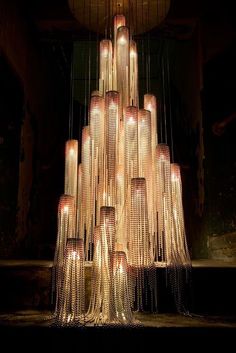 a large chandelier made out of bottles