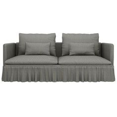 a gray and white striped couch with pillows