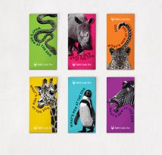 four cards with different animals on them