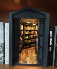 an open book case with several books on the shelves