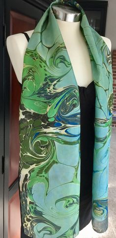 This beautiful silk is 8mm habotai with hand rolled edges.  It can be worn as a scarf, belt or wrap.  It makes a lovely table runner and a unique wall hanging. All of our pieces come wrapped for gift giving in our exclusive water marbled paper! Each includes a picture postcard with care instructions.  A scarf tying guide is also included. Green Silk Scarves For Formal Occasions, Green Silk Scarf For Formal Occasions, Formal Green Silk Scarves, Formal Green Silk Scarf, Artistic Silk Scarves For Weddings, Artistic Silk Scarves For Wedding, Artistic Silk Wedding Scarves, Elegant Hand Dyed Multicolor Silk Scarf, Hand Dyed Multicolor Silk Scarf