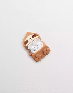 a cell phone case with a monkey design on the front and back cover, sitting on a white surface