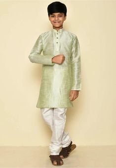 This exquisite Kids Kurta Set is specially crafted for Birthdays , Indian weddings and festivals. The set includes a beautifully self-embroidered Dopion art silk top, paired with your choice of a ready-made Dhoti, Chudidar or Patiyala bottom. Attributes 1. Top - Premium Quality Silk Fabric 2. Bottom - Ready Made Chudidar/ Doti/Patiyala 3.  Color - Fawn/ Yellow/ Light Brown/ Sky Blue/ Sea Green Note For Perfect Fitting * Pls Check the kid's Body Chest Exact Measurement With Out Adding Any Space or Gap From Your Side Kids Kurta Pajama, Ring Bearer Suit, Kids Kurta, Boys Wedding Suits, Wedding Dresses For Kids, Boys Kurta, Kids Rings, Boys Suits, Boys Pajamas