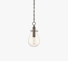 a small light fixture hanging from a chain