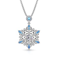 Calm, regal, and reserved, the mysterious beauty of this snowflake inspired necklace will leave you in awe. This snowflake necklace captures the beauty and intricacy of a snowflake gently falling from the sky during a winter snow. It designed is full of detailing, finished with sparkling blue sapphire stones to make it really shine on your neck. The glorious sparkle will turn heads and catch eyes. Give as a gift to someone at Christmas or treat yourself to remind you of this special time of year Winter Snowflake Necklace, Elegant Christmas Snowflake Necklace, Jeulia Jewelry, Snowflake Jewelry, Silver Jewelry Set, Snow Princess, Snowflake Necklace, Classic Necklace, Silver Jewellery Sets