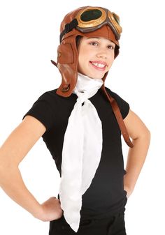 PRICES MAY VARY. Size: Standard VINTAGE HAT: The Amelia Earhart Costume Accessory Kit, a perfect addition to your collection of vintage hats, is made of 100% polyester faux leather and satin. The aviator hat in the kit features metal buckles on the chin strap and size-adjustment strap for a customizable fit. SATIN SCARF: This kit, a tribute to Amelia, also comes with a white satin scarf measuring approximately 78"L x 4"W. The Amelia Earhart inspired plastic goggles have green-tinted lenses, padd Amelia Earhart Costume, Aviator Goggles, Aviator Hat, Amelia Earhart, Easy Costumes, Vintage Trousers, White Scarves, World Records, Cool Costumes