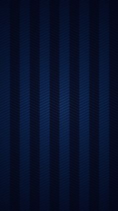 a dark blue background with vertical stripes