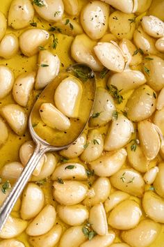 a close up of a spoon in some food