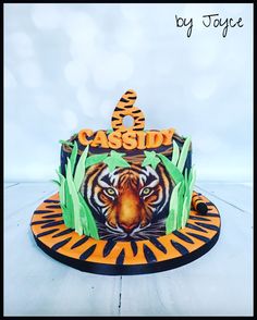 a tiger cake with the name casino on it