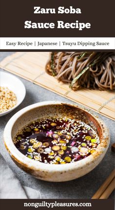 a bowl filled with sauce sitting on top of a table