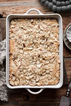 A high altitude tested recipe for almond coffee cake, filled with cream cheese and almond paste, and sprinkled with almond crumble topping. This is a moist and fluffy almond cream cheese coffee cake, lightly spiced with cardamom. Perfect for the holidays for Thanksgiving or Christmas morning breakfast or brunch!