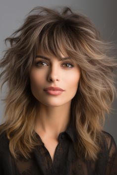 The feathered shag hairstyle with caramel balayage is about creating a soft and dimensional look. The feathered layers add texture to the haircut, while the caramel balayage highlights bring warmth. Click here to check out more trending wolf haircut ideas for 2023. New Long Hairstyles 2023, Long Layered Shaggy Haircut, Home Layered Haircut, Hairstyles For Women Over 60 Medium With Glasses, Choppy Medium Length Hair With Bangs, Long Feathered Hairstyles Layered Hair, Wolf Haircut Long Hair With Bangs, Carmel Highlights On Brown Hair Chunky, Shaggy Lob With Bangs Round Faces Long