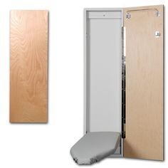 an open wooden door with a toilet seat in front of it and another closed wood door on the other side