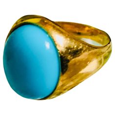 This is an 18K yellow gold and Turquoise ring. It depicts an oval shaped cabochon Turquoise stone mounted in gold bezel setting. The Turquoise’s width and length is 0.4 and 0.5 inches, respectively. The ring is signed 18K behind one of the shank. Fine Jewelry 14k Gold Turquoise Cabochon Ring, 14k Gold Turquoise Cabochon Ring, Luxury Gold Cabochon Turquoise Ring, Luxury Yellow Gold Turquoise Ring, Oval Cabochon, Luxury Turquoise Gemstone Ring, Oval Cabochon, Signet Ring, Turquoise Stone, Bezel Setting, Turquoise Ring