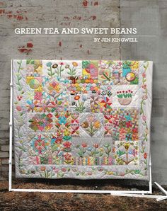 the cover of green tea and sweet beans by jenny kingwell, with an image of flowers