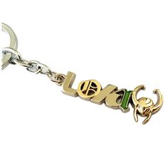 a key chain with the word love written in gold and green letters, on a white background