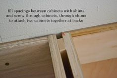 there is a sign on the wall that says, fill spaces between cabinets with shims and screws through cabinets, through sinks to attach two cabinets together at backs