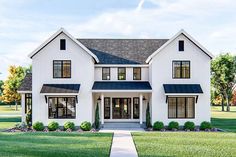 a white two story house with black shutters on the front and side windows, along with green grass