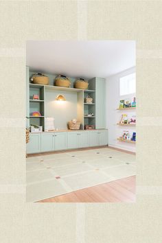 an empty room with shelves and baskets on the wall