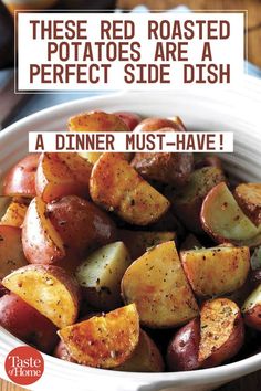 a white bowl filled with potatoes on top of a wooden table