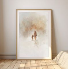 an art print of a man and his dog walking in the snow