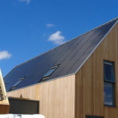 a house with a solar panel on the roof