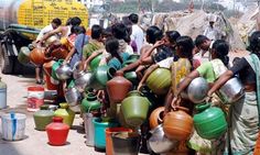 many people are standing around with pots and pans