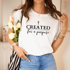 Created for a Purpose T-shirt. Everyone deserves the perfect t-shirt to have you feel confident, comforted, and strong. This awesome Christian t-shirt is all that and more! It's soft, sleek, and stylish for any occasion. Create your own unique Christian outfit with a trendy maxi skirt for a fun spring fashion, or layer it with your favorite jacket for a sophisticated style worthy to wear to work or dinner with friends. It's an ideal Christian t-shirt that will keep you comfy and looking smart. S Created For A Purpose, Struggle Bus, Vinyl Svg, Christian Hats, Faith Clothing, Patriotic Outfit, Rough Day, Christian Sweatshirt, Christian T Shirt