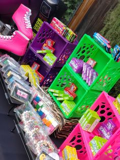 the back of a car filled with lots of toys and candy bars in bins