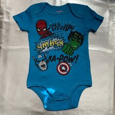 Blue Onesie Of Marvel Superheroes Hulk, Spider-Man, And Captain America. 60% Cotton And 40% Polyester. Brand New. Never Been Worn. Hulk Superhero, Avengers Superheroes, Marvel Shirt, Marvel Superheroes, Hulk, Captain America, Shower Ideas, Kids Shirts, Marvel Comics