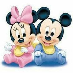 two mickey and minnie mouses sitting next to each other