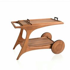 a wooden table with wheels on it and two trays attached to the top shelf