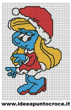 the smurf is wearing a santa claus hat and holding a blue bird in his hand