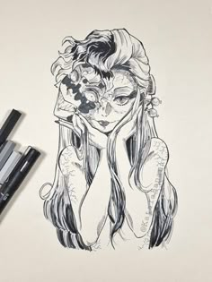 a drawing of a woman with long hair and flowers on her head is next to two markers