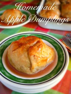 homemade apple dumplings on a green and white plate