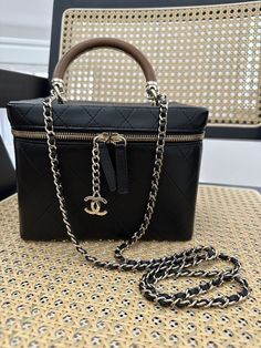 Chanel 18K Fall Runway Knock on Wood Vanity. Made in France. Unique wood handle, black calfskin, with gold interlace chain. This bag has been lightly used and has no flaws. Will come with original box, dustbag, authenticity card, and tag. Purchased for $5900 retail. Comes from a smoke and pet free home. Knock On Wood, Fall Runway, Vanity Bag, Wood Vanity, Wood Handle, Knock Knock, Made In France, Calf Skin, Bags Handbags