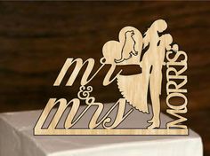 a wooden sign that says mr and mrs on it