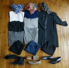 clothes and shoes laid out on the floor