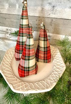 three plaid christmas trees on a white plate