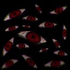 an abstract image of red eyes in the dark