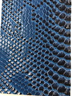 an alligator skin pattern is shown in blue