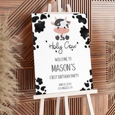 a welcome sign for a baby cow themed birthday party