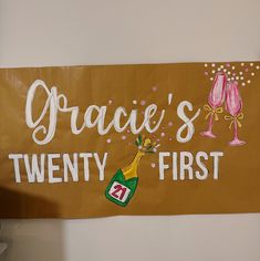 there is a sign that says grace's twenty first with two glasses on it