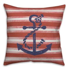 an anchor on red and white striped pillow