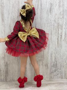 Celebrate the holiday season in style with our Christmas Red and Gold Tartan Dress. This enchanting dress is perfect for your baby girl or toddler, featuring a classic tartan pattern in festive red and gold. Ideal for Christmas celebrations, birthday parties, or any special occasion! Product: Christmas Tartan Dress Fabric: Soft, breathable cotton Design: Red and gold tartan pattern with a charming tutu skirt Perfect For: Holiday parties, birthday celebrations, and festive gatherings Available Si Toddler Christmas Dresses, Cute Red Holiday Dress For Dress-up, Festive Red Princess Dress For Dress-up, Cute Winter Princess Dress For Party, Holiday Princess Dress For Party Season, Cute Long Sleeve Holiday Dress For Party, Cute Long Sleeve Holiday Party Dress, Cute Christmas Princess Dress For Party, Cute Christmas Party Princess Dress