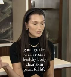 a woman sitting in front of a counter with her eyes closed and the words good grates clean room healthy body clear skin peaceful life