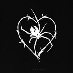 a heart with barbed wire in the shape of a spider on it's back