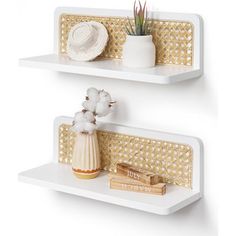 two white shelves with decorative items on them