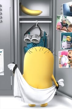 a minion standing in front of a locker with pictures on it