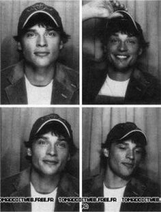 four different pictures of the same person in black and white, one is wearing a hat